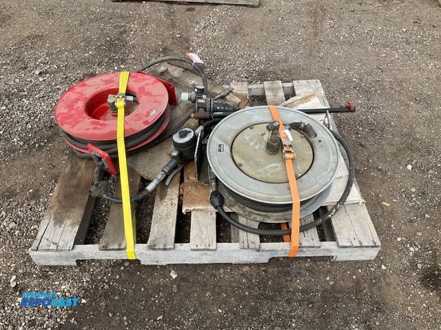 Lot 2-40560 - (2) retractable hose reels with fluid hoses and dispensers, used
