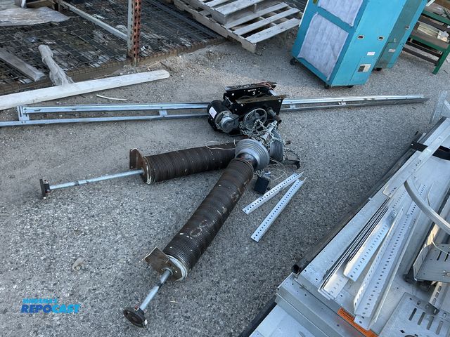 Lot 2-38389 - Garage door torsion spring system - not assembled