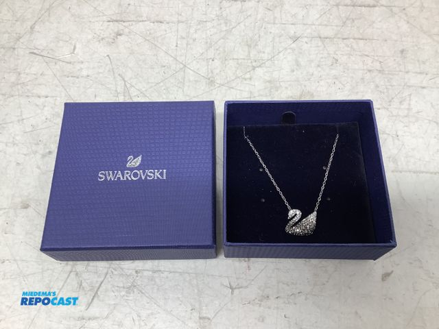 Lot 2-74027 - New Swarovski iconic swan pendant necklace, rhodium plated chain and clear crystal pave’