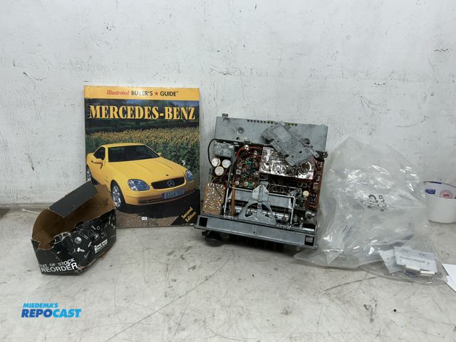 Lot 2-67026 - Box of battery assortment and tools for cars and books about specific cars