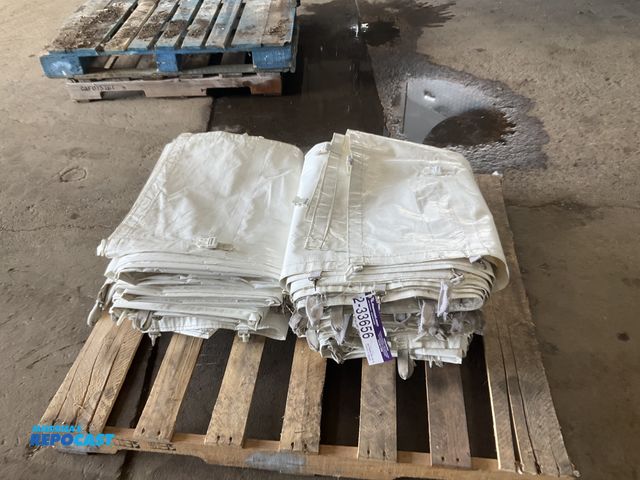 Lot 2-33656 - (10) 7’ x 30’ white vinyl tent sides, used