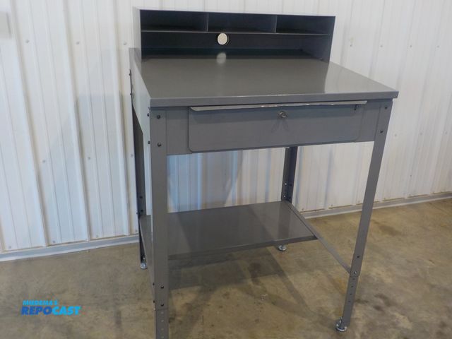 Lot 2-34213 - Industrial personal work station. One pull out drawer. Upper cubbies. Bottom shelf. Adjustable feet....