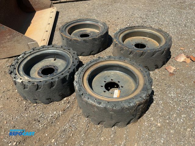 Lot 2-43412 - (4) Used Mitco 33x12-20 Solid Rubber Skid Steer Tires and Wheels, 8 on 8” bolt pattern