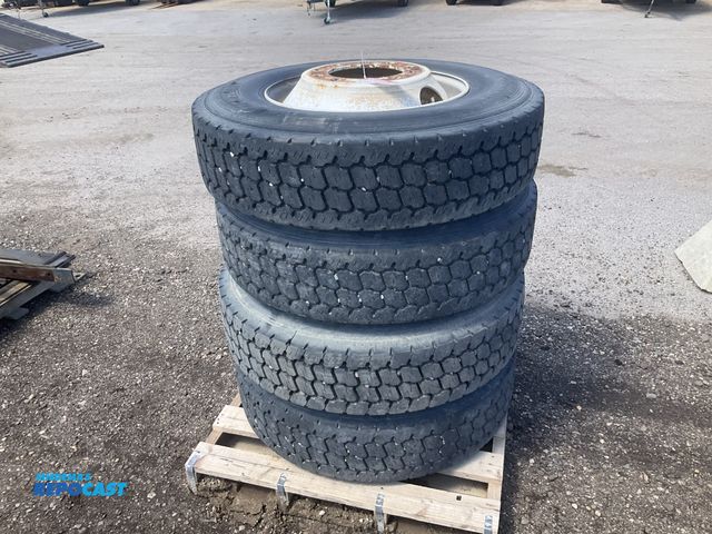 Lot 2-43666 - (4) recap 275/80R22.5 semi tires on steel wheels, used