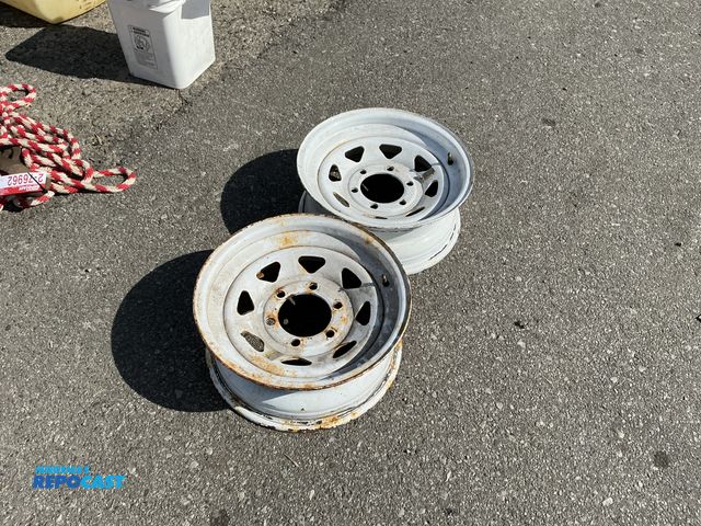 Lot 2-76964 - (2) white rims 15x6.