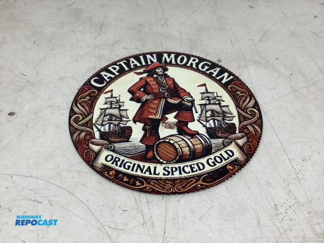 Lot 2-75382 - Captain Morgan circular metal tin sign approx. 8”