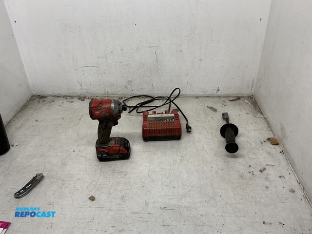 Lot 2-25251 - Lot of (1) M18 FUEL 1/4" Hex Impact Driver w/ (1) Milwaukee M18 Battery Charger w/ Extra handle