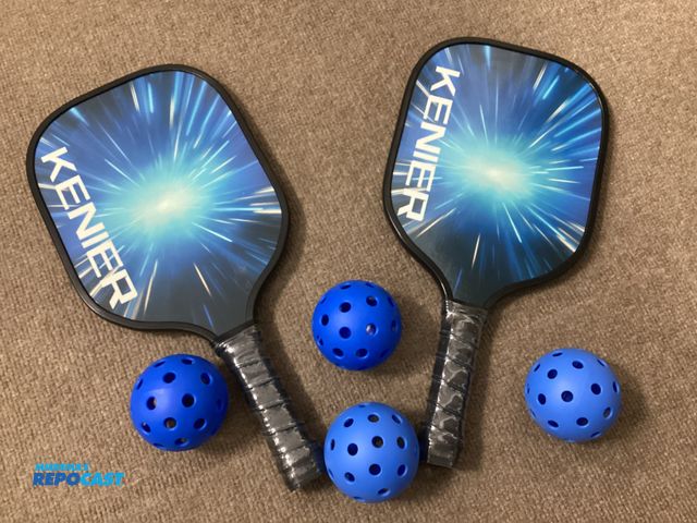 Lot 2-76416 - New Kenier Pickleball set. Includes 2 paddles and four balls in carrying case.