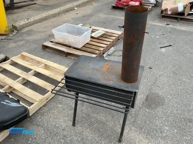 Lot 2-96090 - Free standing wood stove with 5” smoke stack