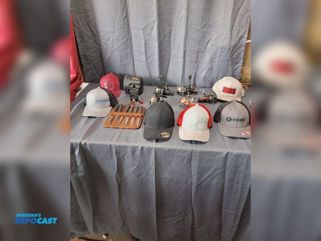 Lot 2-34572 - Men's Lot of Fishing Reels, Hats, Knives, and Cabela Light