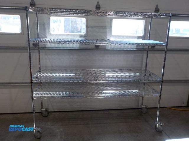 Lot 2-34122 - Metro four shelf storage rack. Locking castors. Adjustable shelves. NSF approved. 72" w x 24" d x 69...