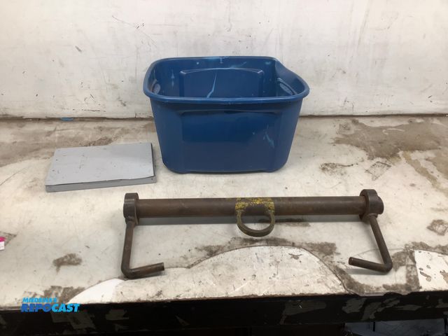 Lot 2-25303 - Clipboard, 1-1/4” drywall nails, and unknown application metal bar with moving hooks