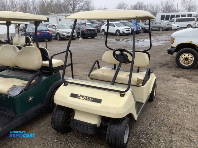 Lot 2-93576 - Golf Cart Club car with charger.
