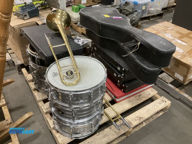 Lot 2-77154 - Skid of Instruments with Cases Including Drums, Trombone, Guitars, and Chime Sets - Need work