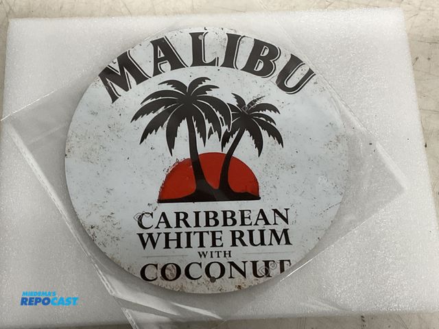 Lot 2-60963 - New 7.75” diameter Malibu Rum themed tin sign