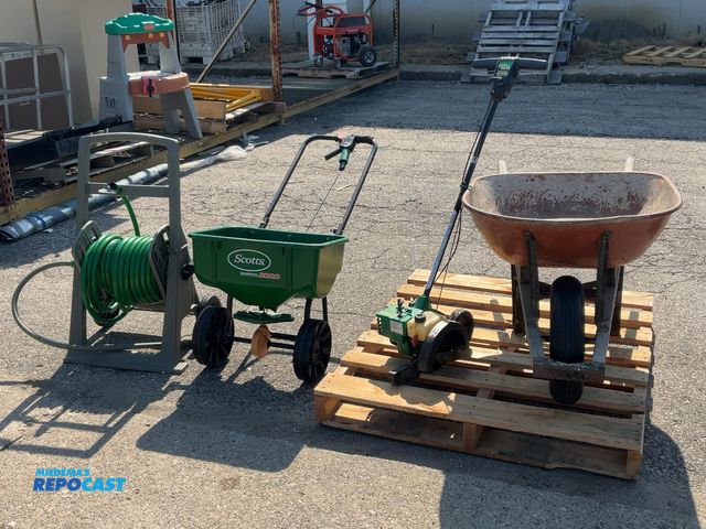 Lot 2-24620 - Yard and garden lot. Wheel barrow, Scotts fertilizer spreader, hose reel with hose, &amp; weed eater...