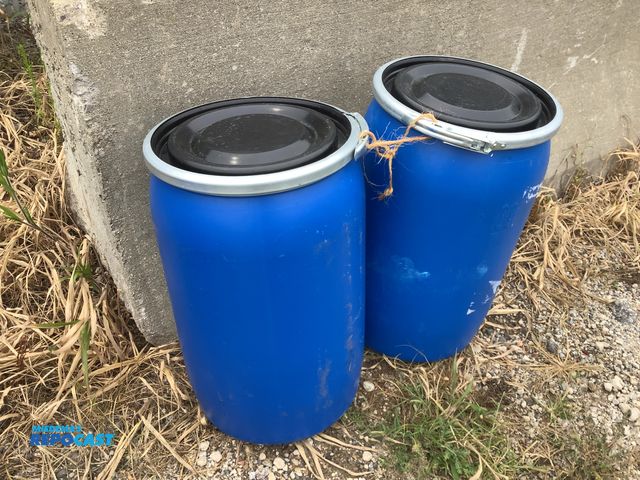 Lot 2-18416 - Lot of (2) 10 gallon blue plastic barrel with removable lid and locking rings. Clean inside. Contain...