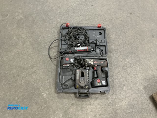 Lot 2-69090 - snap on impact wrench 18 volt includes charger and case needs new batteries also includes snap on wo...