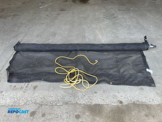 Lot 2-72737 - New manual debris tarp for dump truck, 84'' wide x 15' long