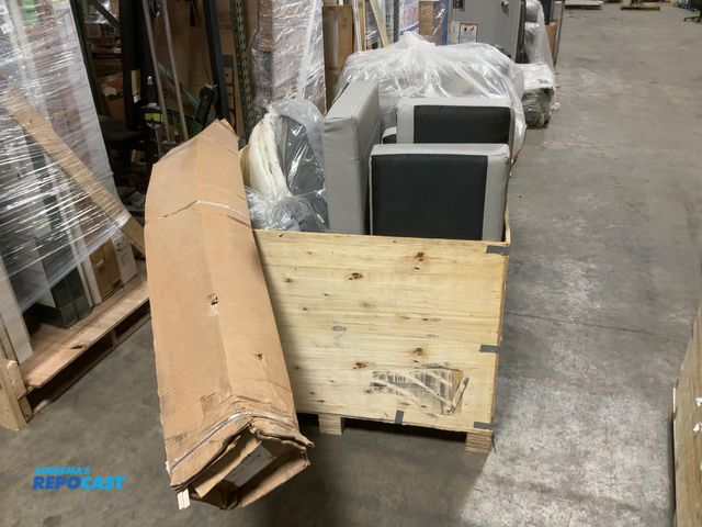 Lot 2-60459 - Crate of Miscellaneous RV Parts Including Dinette Cushions, Throw Pillows, Blankets, and Rustic Elm ...