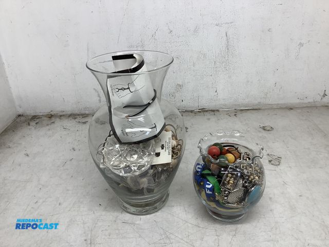 Lot 2-73405 - (2) jars of various jewelry including bracelets, necklaces earrings, trays, and more