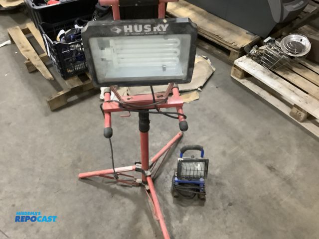 Lot 2-33195 - (2) work lights one Husky light with stand and one small unknown light