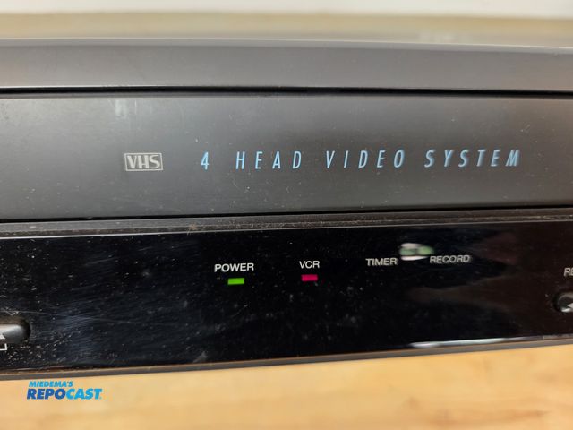 Lot 2-40297 - VHS Players Vhs lot of 2 VHS players, both powered up, engaged in play, rev and fwd.