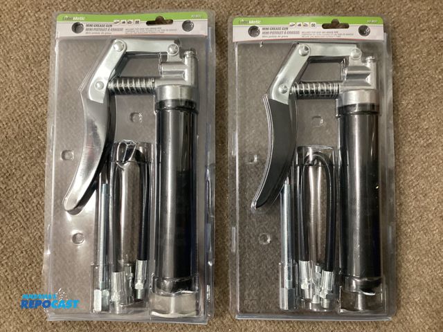Lot 2-92894 - 2 New LubriMatic mini Pistol Grease Guns. Includes flex hose and grease pipe. Grease guns develop up...