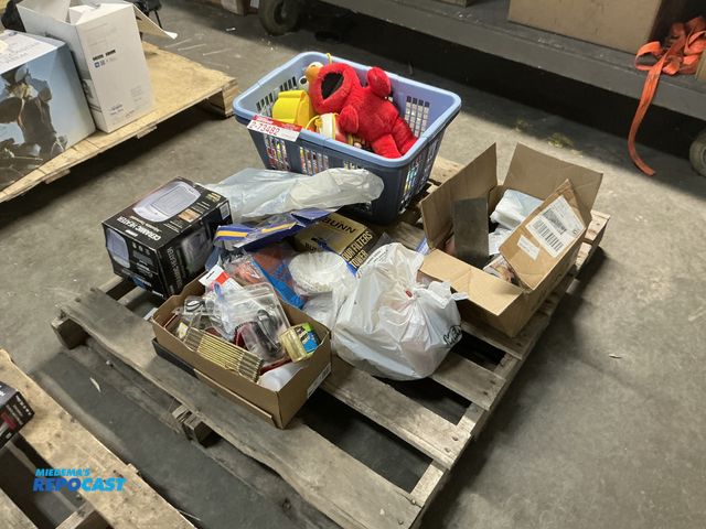 Lot 2-73482 - Skid lot of assorted items including children’s toys, assorted plastic kitchenware, and a ceramic he...