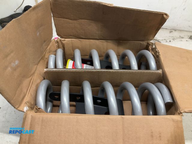 Lot 2-65673 - Pair of Springs/Shackles with a 2” Drop for 2004 Chevy/GMC Pickup