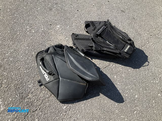 Lot 2-75138 - Lot of (2) Polaris snowmobile saddle bags, new condition but dirty from storage