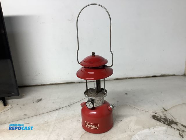Lot 2-27349 - vintage coleman lantern, painted red, needs new glass globe, 12" tall