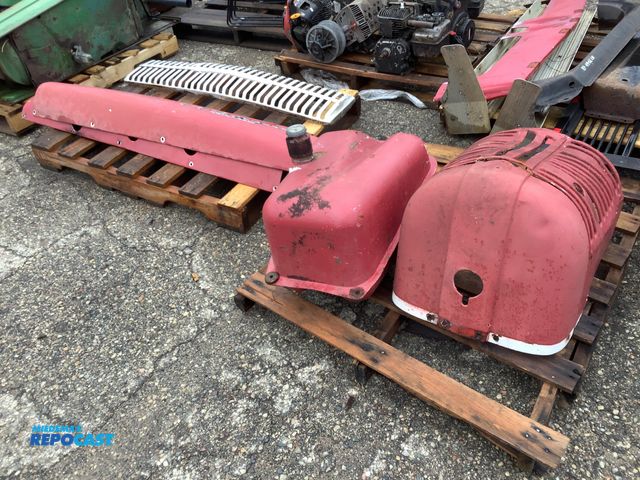 Lot 2-79989 - Lot of vintage international, and McCormick parts including a international grill, McCormick farm al...