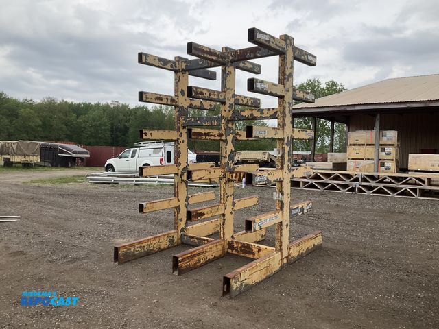 Lot 2-34495 - Two sided metal cantilever rack 80”W x 106” x 124”T overall, 30” long rack arms, used