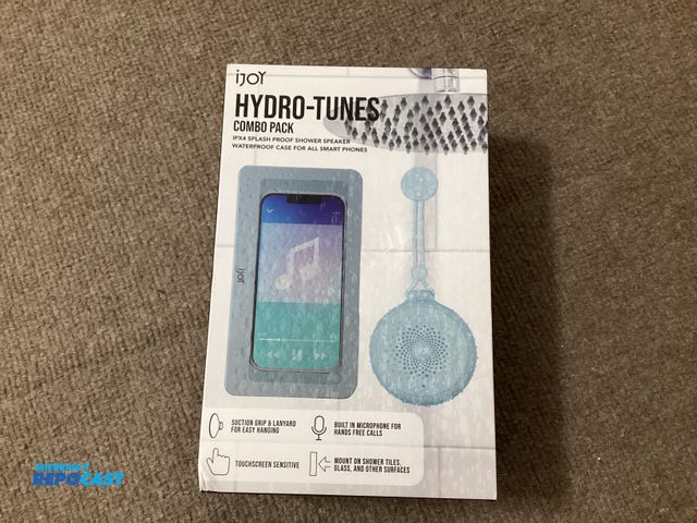 Lot 2-63239 - New iJoy Hydro-Tunes combo pack. IPX4 splashproof shower speaker, and waterproof case for all smart ...