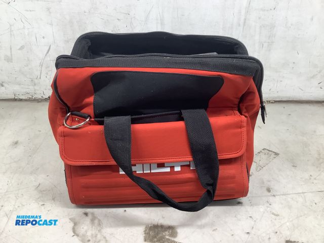 Lot 2-27636 - Hilti bag with tools including a grinder, a jigsaw, and more