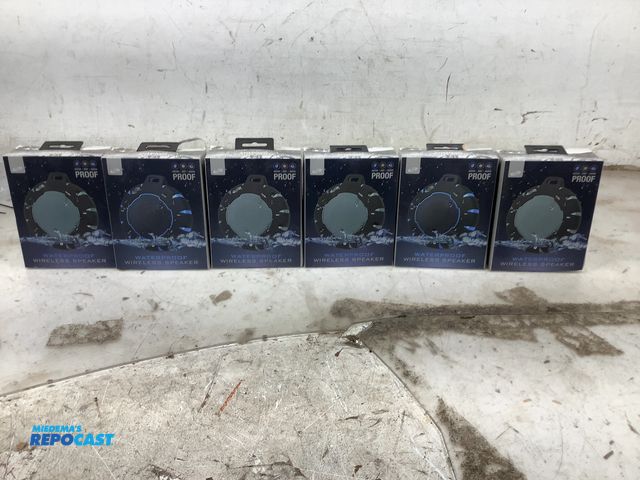 Lot 2-92579 - New Lot of round I live waterproof wireless speaker, in color grey and blue
