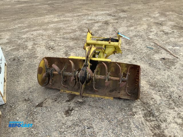 Lot 2-93218 - Yellow make and model unknown rotor tiller