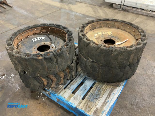 Lot 2-43081 - (4) Used Solid Rubber Skid Steer Tires/Wheels, two different sizes, two measure approx. 32” diameter...