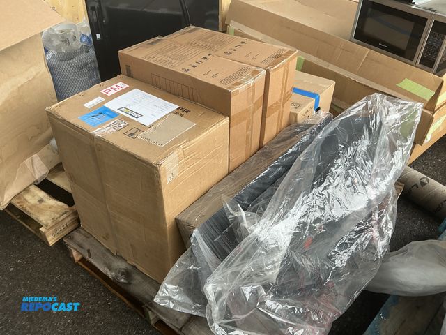 Lot 2-24554 - RV appliances and electronic components, including fireplace glass, and 12v range hoods.