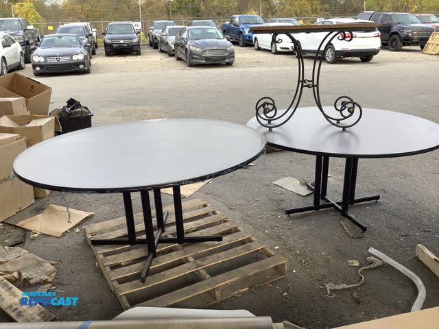Lot 2-67634 - Lot of (3) tables with wooden tops Including: (2) circular 59” in diameter and 39” tall and (1) rect...