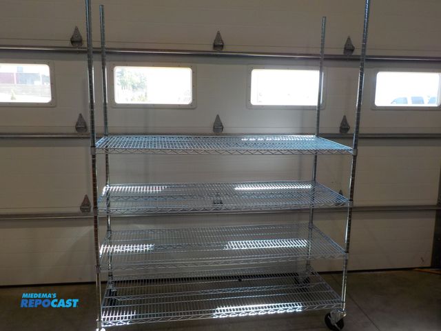Lot 2-34123 - Metro four shelf storage rack. Locking castors. Adjustable shelves. NSF approved. 60" w x 24"d x 80"...