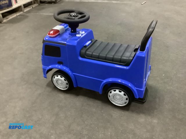 Lot 2-93604 - Toddler ride on police car with working lights but needs batteries, the car also has a horn, small s...