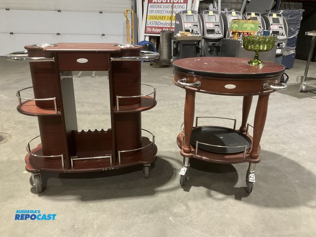 Lot 2-55125 - Lot including (1) Geneva portable wine &amp; liquor trolley cart and (1) Geneva serving cart with a ...