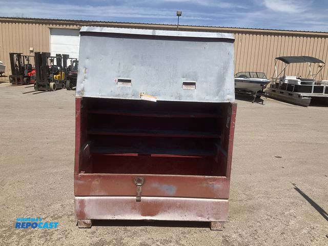 Lot 2-43465 - Knaack storage box with flip top, 60.5”W x 30” x 49.5”T overall, scattered dents, lift struts are mi...