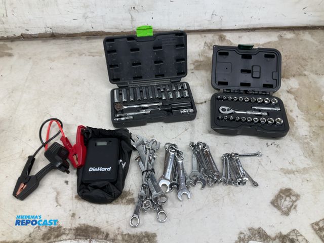 Lot 2-19667 - Box of assorted hand tools including die hard portable jump pack, wrenches, and (2) socket sets