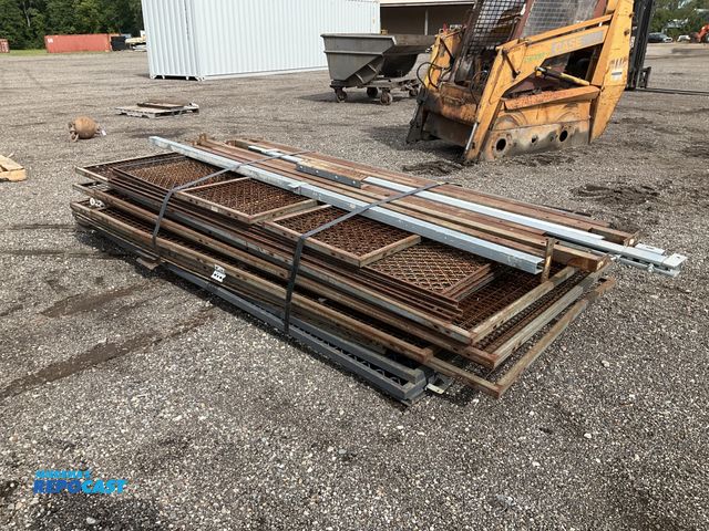 Lot 2-40893 - Wire grate panels and metal posts to make a toll/storage room, (16) panels 48”W with lengths from 8’...