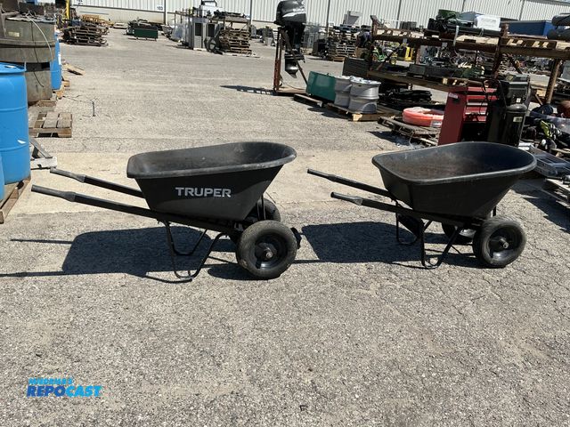 Lot 2-76778 - Lot of (2) black plastic Truper Wheelbarrows