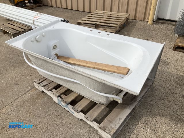 Lot 2-42330 - Fiberglass whirlpool tub with pump 5’L x 3’W x 20.5”T overall, 120 volt electric pump, some scuffs/s...