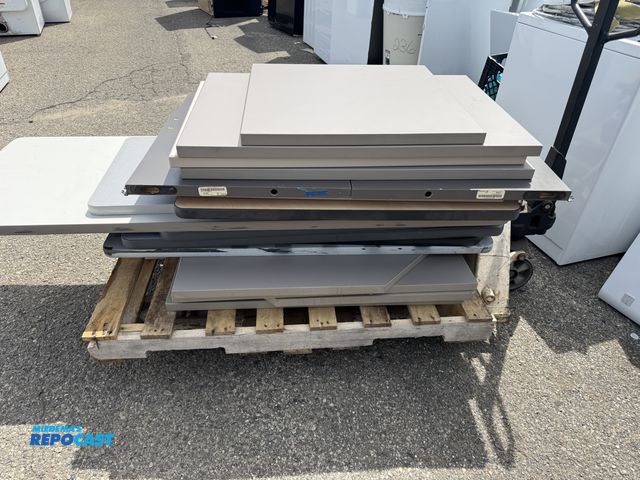 Lot 2-64142 - 1 skid Lot of desk tops Desk Large lot of desk tops